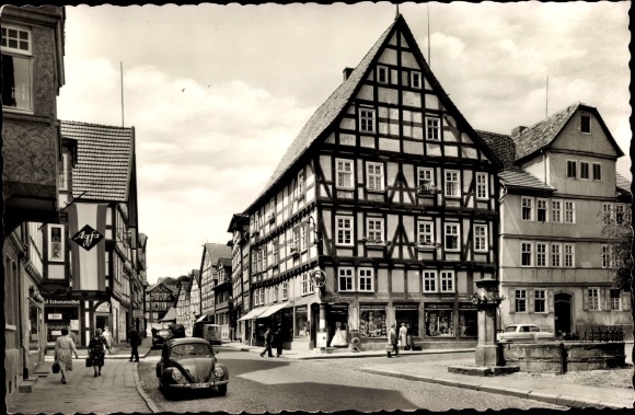 Postcard Melsungen in Hessen, Fritzlarer Strasse, shops, car