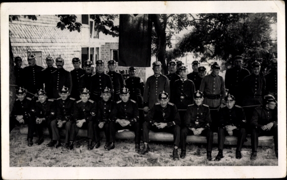 Postcard fire brigade, group portrait