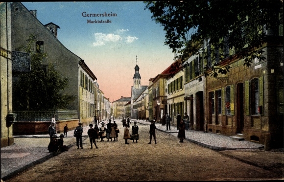 Postcard Germersheim, view of the market street with passers-by and church