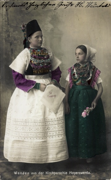 Postcard Hoyerswerda in Upper Lusatia, two girls in traditional clothing, jewelry, blooming garden