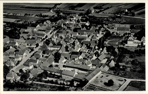 Postcard Gelchsheim in Lower Franconia, aerial view of numerous roofs, rural surroundings