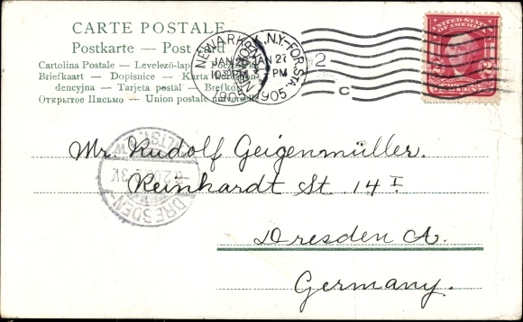 Postcard Woman sitting under the umbrella of a mushroom, man