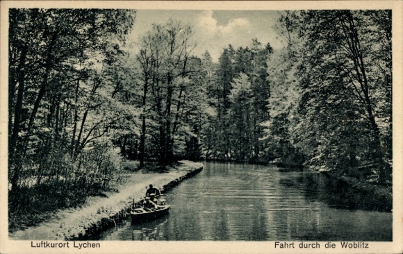 Ak Luftkurort Lychen, Fahrt durch Woblitz, Partie am Fluss