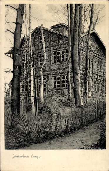Ak Lemgo in Lippe, Junkerhaus, historisches Gebäude, Bäume, Weg