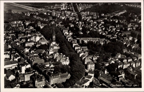 Postcard Gießen an der Lahn Hesse, aerial view of cityscape, many houses, trees, church
