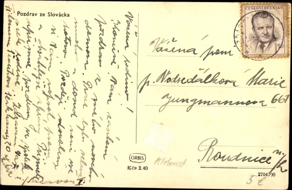 Postcard Women and men in Slovak costumes, ornaments on house facades