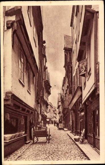 Postcard Morlaix Finistère, street with half-timbered houses, paved path, wagon, sign 'NEVA'