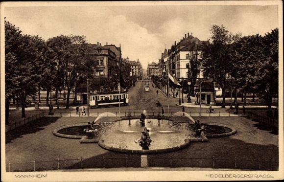 Postcard Mannheim in Baden, Heidelberger Straße, fountain, houses, tram, trees