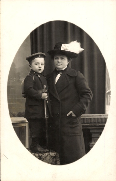 Photo Postcard Fürstenfeldbruck in Upper Bavaria, woman with hat and little boy in uniform