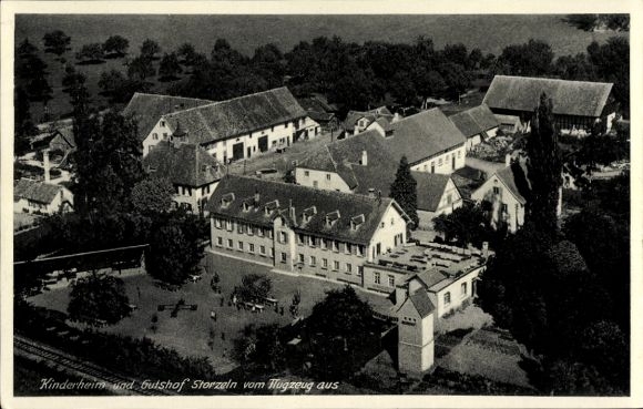 Ak Storzeln Hilzingen im Hegau, Luftaufnahme von Kinderheim, Gutshof Storzeln