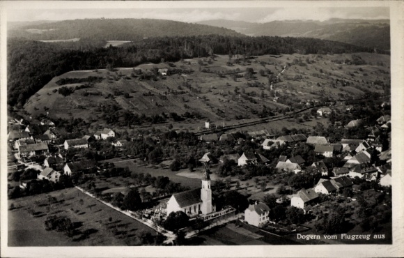 Postcard Dogern am Rhein, aerial view of church visible, rural surroundings, houses, trees