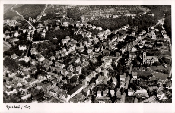Postcard Betzdorf an der Sieg, aerial view of many houses, green surroundings, churches