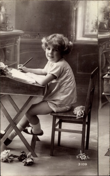 Postcard boy at the desk, misprint