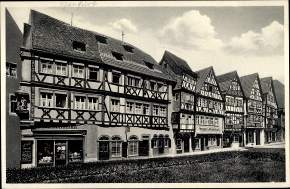 Ak Ochsenfurt am Main Unterfranken, Alte Fachwerkhäuser in der Adolf Hitler Straße, Geschäft