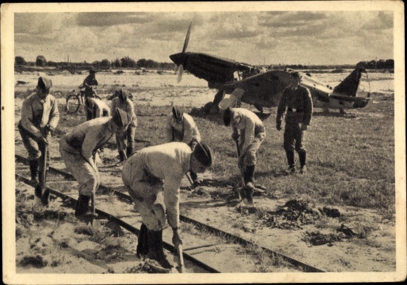 Postcard Reich Labor Service helps the Luftwaffe in the East, fighter aircraft, Soviet field airfield