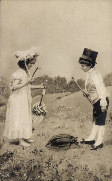 Photomontage Postcard child portrait, girl and boy on the meadow watching a beetle