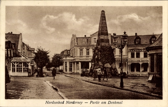 Postcard North Sea resort Norderney East Frisia, North Sea resort monument, old buildings, street view