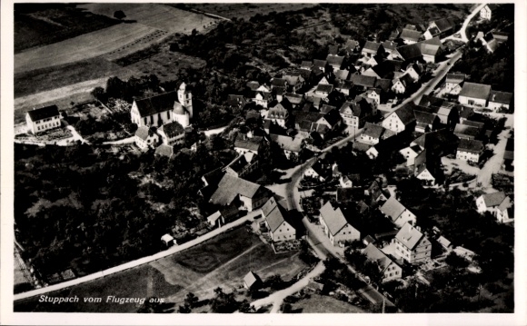 Postcard Stuppach Bad Mergentheim in Tauberfranken, aerial view of residential buildings, church, rural land