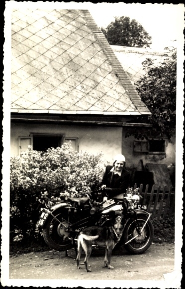 Photo Postcard woman on a motorcycle, dog