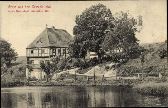 Ak Neuhausen im Erzgebirge, Gruss aus dem Schweinitztal, altes Bauernhaus v. J. 1686