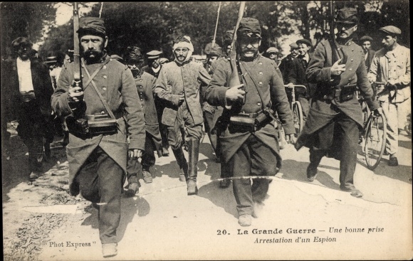 Photo Postcard French soldiers with captured spy, WWI