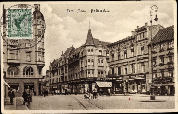 Postcard Forst in der Niederlausitz, Berliner Platz, commercial buildings