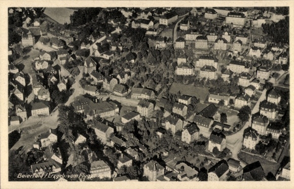 Postcard Grünhain Beierfeld in the Ore Mountains Saxony, view of the town, aerial photograph