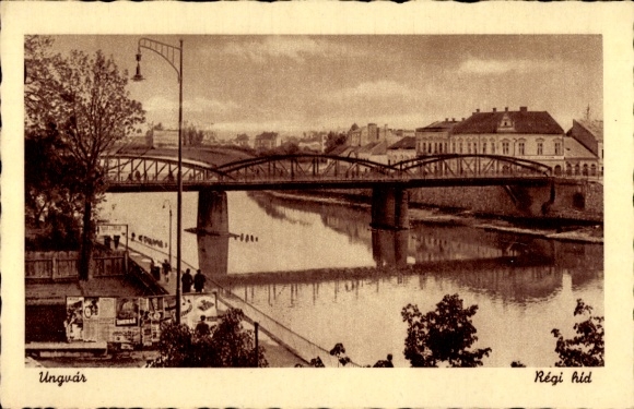 Ak Uschhorod Ungvár Ungwar Ukraine, Brücke über den Fluss, Bäume, Gebäude im Hintergrund