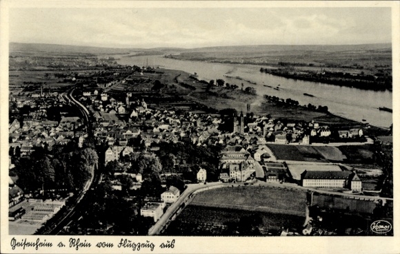Postcard Geisenheim am Rhein Hesse, aerial view of Geisenheim am Rhein, river and city view
