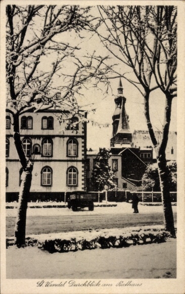 Postcard St. Wendel in Saarland, snowy landscape, town hall, old tower, park-like surroundings