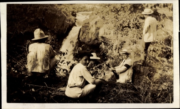 Photo South America, travelers at a waterfall