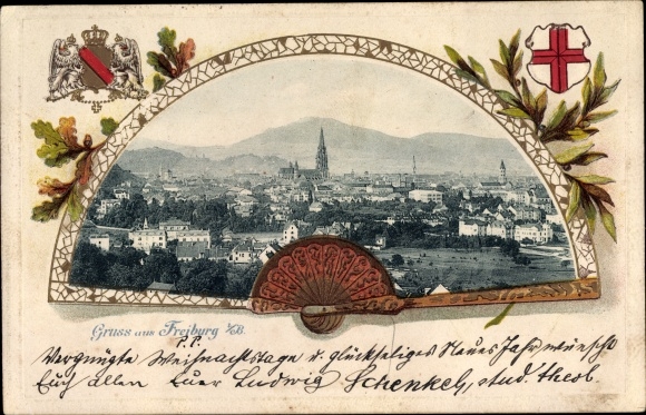 Embossed passepartout PC Freiburg im Breisgau, total view of the village, fans, coat of arms