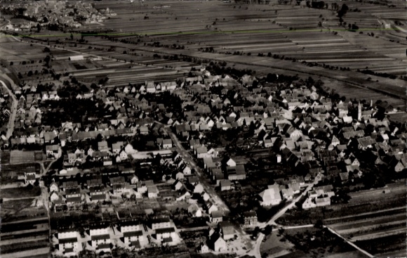 Postcard Spöck Stutensee in Baden, aerial view of a village, many houses, fields in the background
