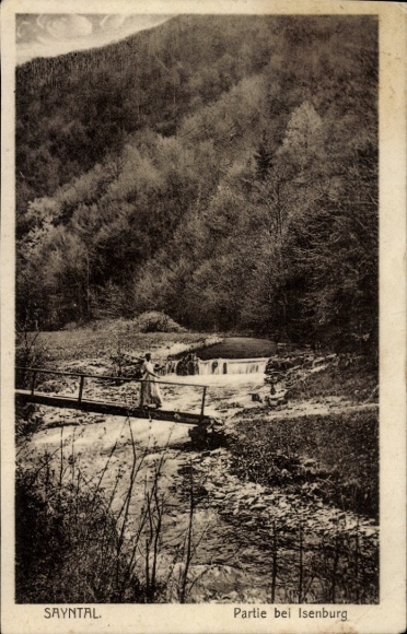 Postcard Isenburg in Sayntal Westerwald, scene near Isenburg, woman on a bridge over a river...