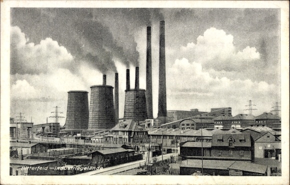 Postcard Bitterfeld in Saxony-Anhalt, industrial landscape, large industrial plants, smoking chimneys