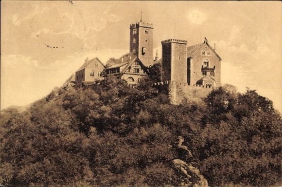 PC Lutherstadt Eisenach in Thuringia, Wartburg, castle on a hill, trees in the foreground, sepia