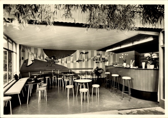 Postcard Waging am See Upper Bavaria, interior scene of a milk bar, modern furnishings, tables and chairs