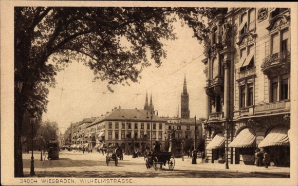 Ak Wiesbaden in Hessen,  Wilhelmstraße, Straßenansicht, Pferdewagen,  Gebäude
