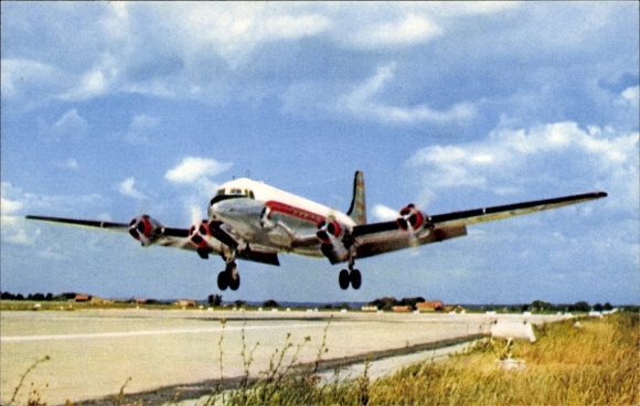 Postcard passenger aircraft Douglas DC 4, Cie Air Algérie, landing