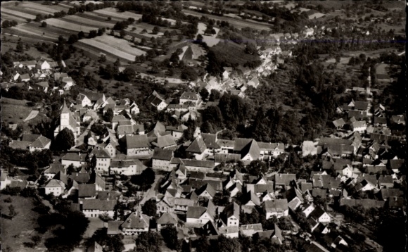 Postcard Schliengen in the Black Forest, aerial view of the village, typical houses, surrounding fields