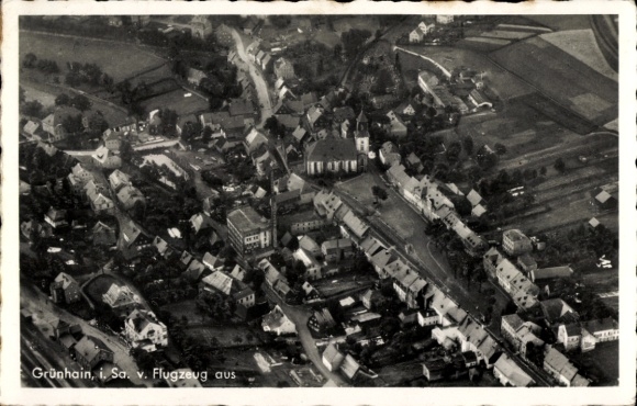 Postcard Grünhain in the Ore Mountains Saxony, aerial view of the village