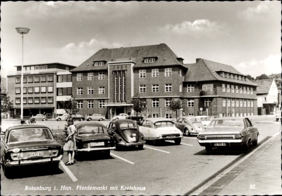 Rotenburg sign in Hann. Rotenburg an der Wümme, horse market, district office, parking lot, VW Beetle