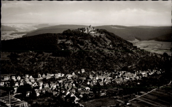Postcard Breuberg in the Odenwald, aerial view of the village surrounding the castle, landscape in the background