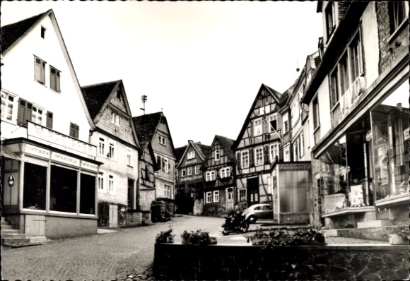 Postcard Ortenberg in Wetteraukreis Hessen, Old Market, half-timbered houses, shop of W. Pfeiffer