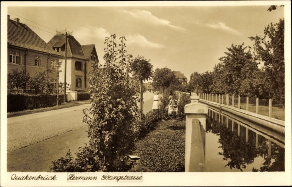 Ak Quakenbrück in Niedersachsen, Hermann Göringstraße, Wohnhäuser, Uferpartie