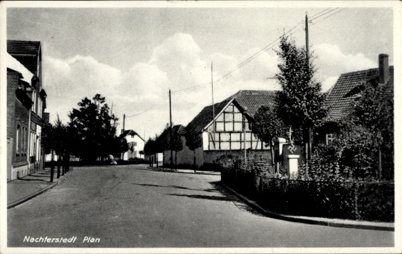 Ak Nachterstedt Seeland Saksen Anhalt, plan van rustige straat, huizen, bomen, blauwe lucht