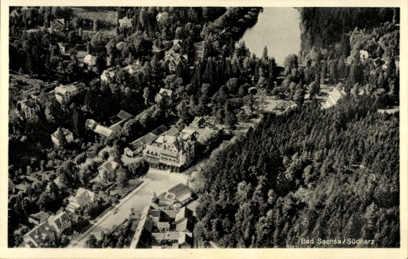 Ak Bad Sachsa im Harz, Luftaufnahme von  Wohnhäuser, Wald, Fluss, 1950er Jahre