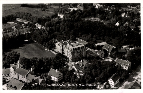 Postcard Bad Wörishofen in Unterallgäu, aerial view of Hotel Victoria, many trees and buildings