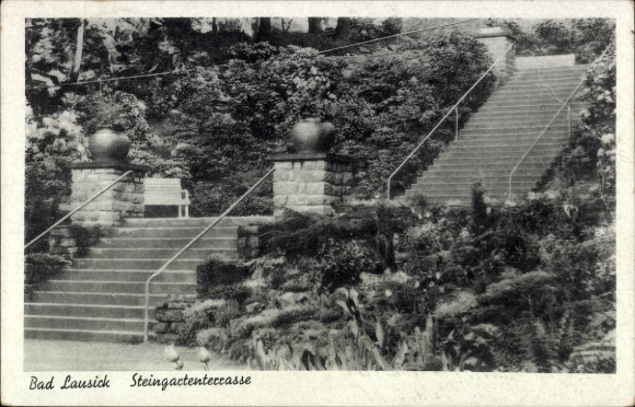 Ak Bad Lausick in Sachsen, Bad Lausick Steingartenterrasse, Treppen, Pflanzen, Bank