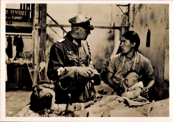 Photo of a German military doctor, France 1940, Wehrmacht helping French civilians, WWII